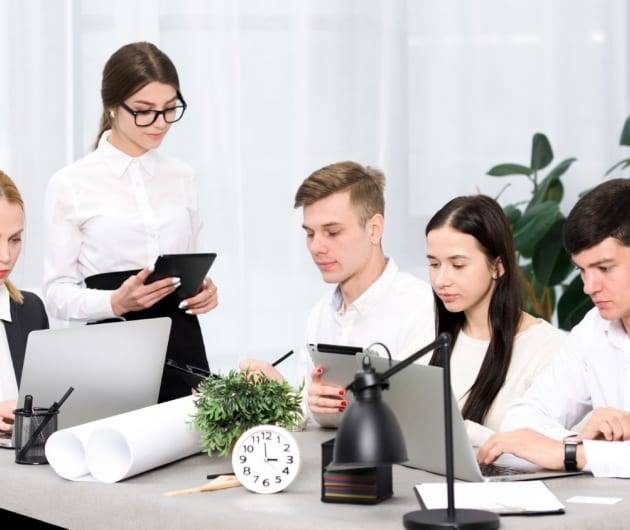 A group of Clinical Counsellors sitting at a table.